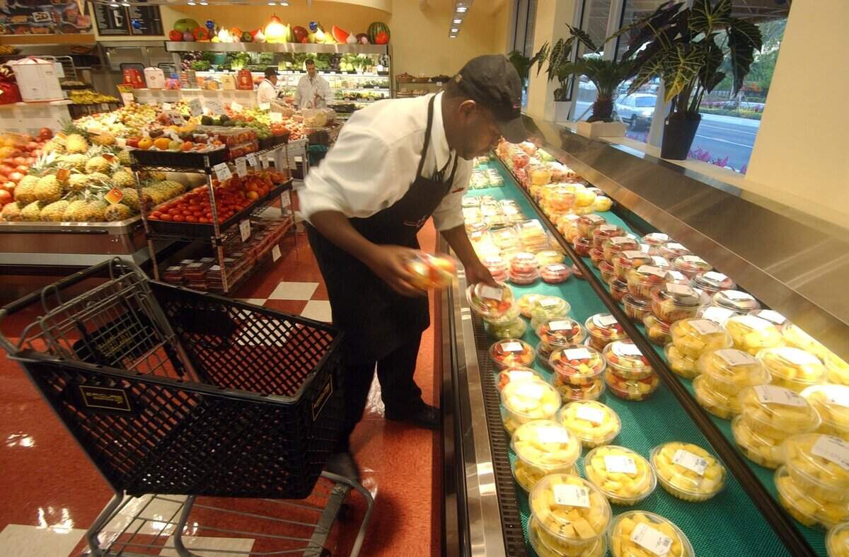 In 2008, Arthur Ford, a produce manager at Epicure in Sunny Isles Beach, takes care of the stock.
